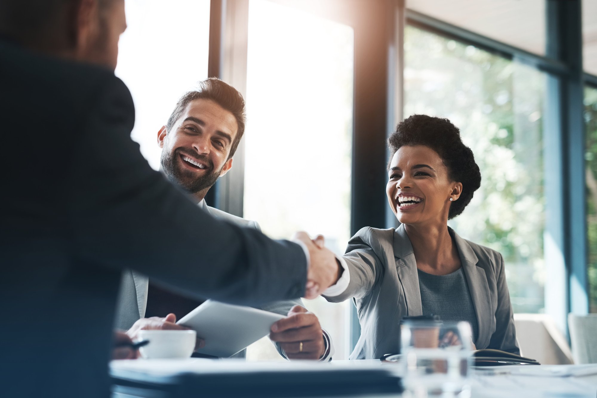 business people, handshake and meeting in teamwork for partnership